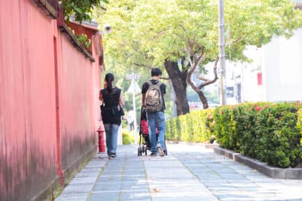 Couple with children in Taiwan where a record number of men have taken leave.